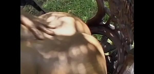  Busty ebony panther with yummy ass rides hard black cock in the park
